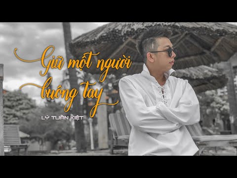 Giữ Một Người Buông Tay - Lý Tuấn Kiệt [ Audio Lyrics ]